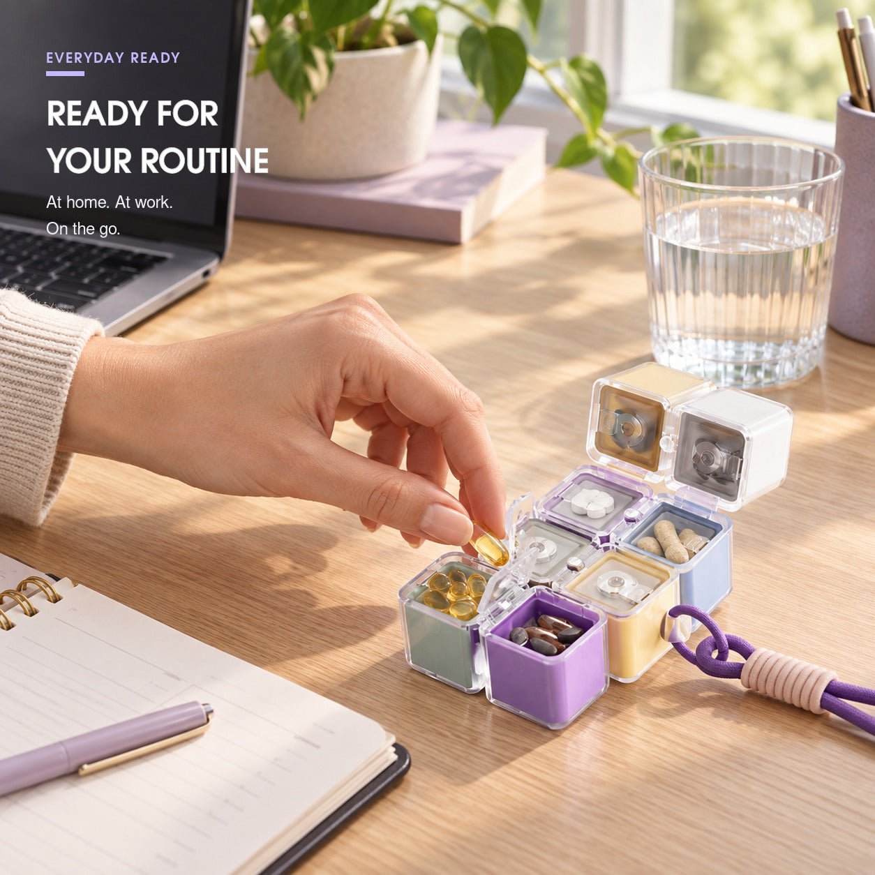 Compact eight-compartment pill organizer used during an everyday desk routine