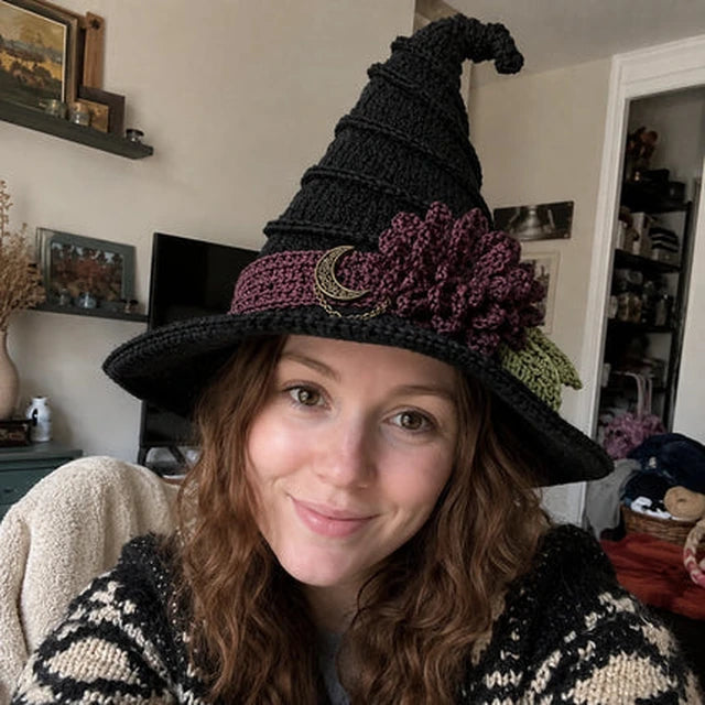 Customer selfie wearing a black crochet witch hat