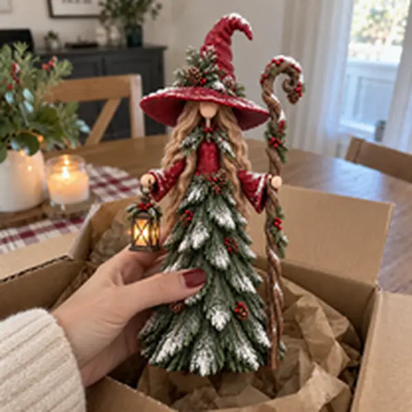 Customer-style unboxing photo of a red Christmas tree figurine