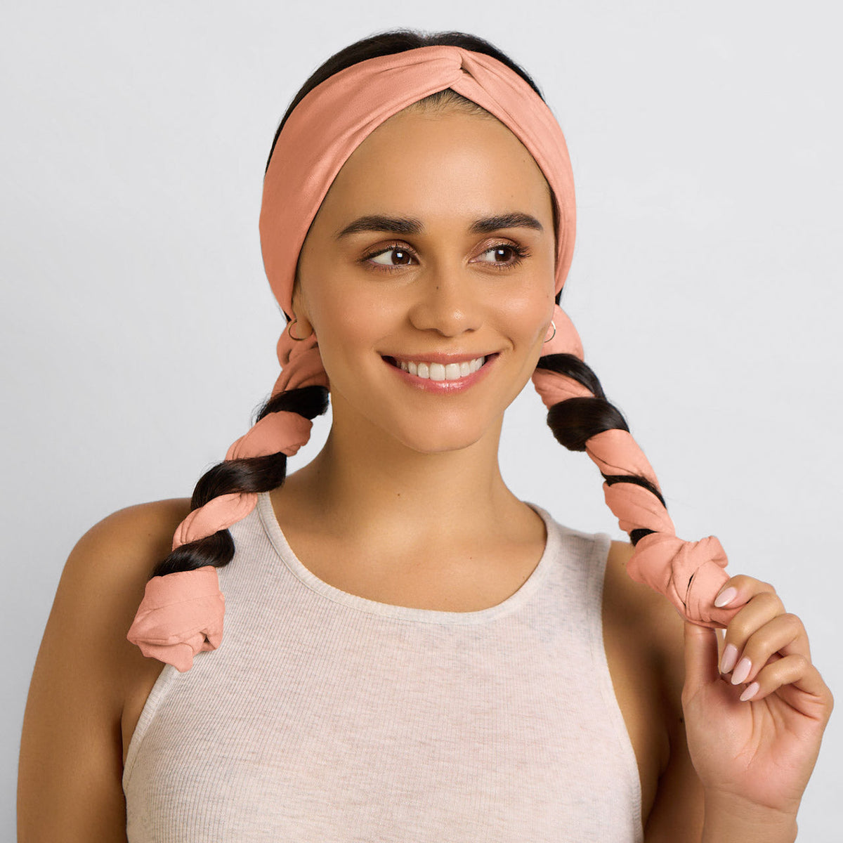 Woman wearing active heatless curling headband