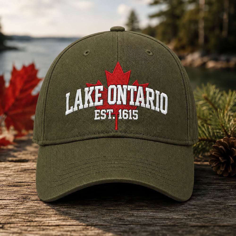 Woman wearing Lake Ontario cap at lakeside cottage