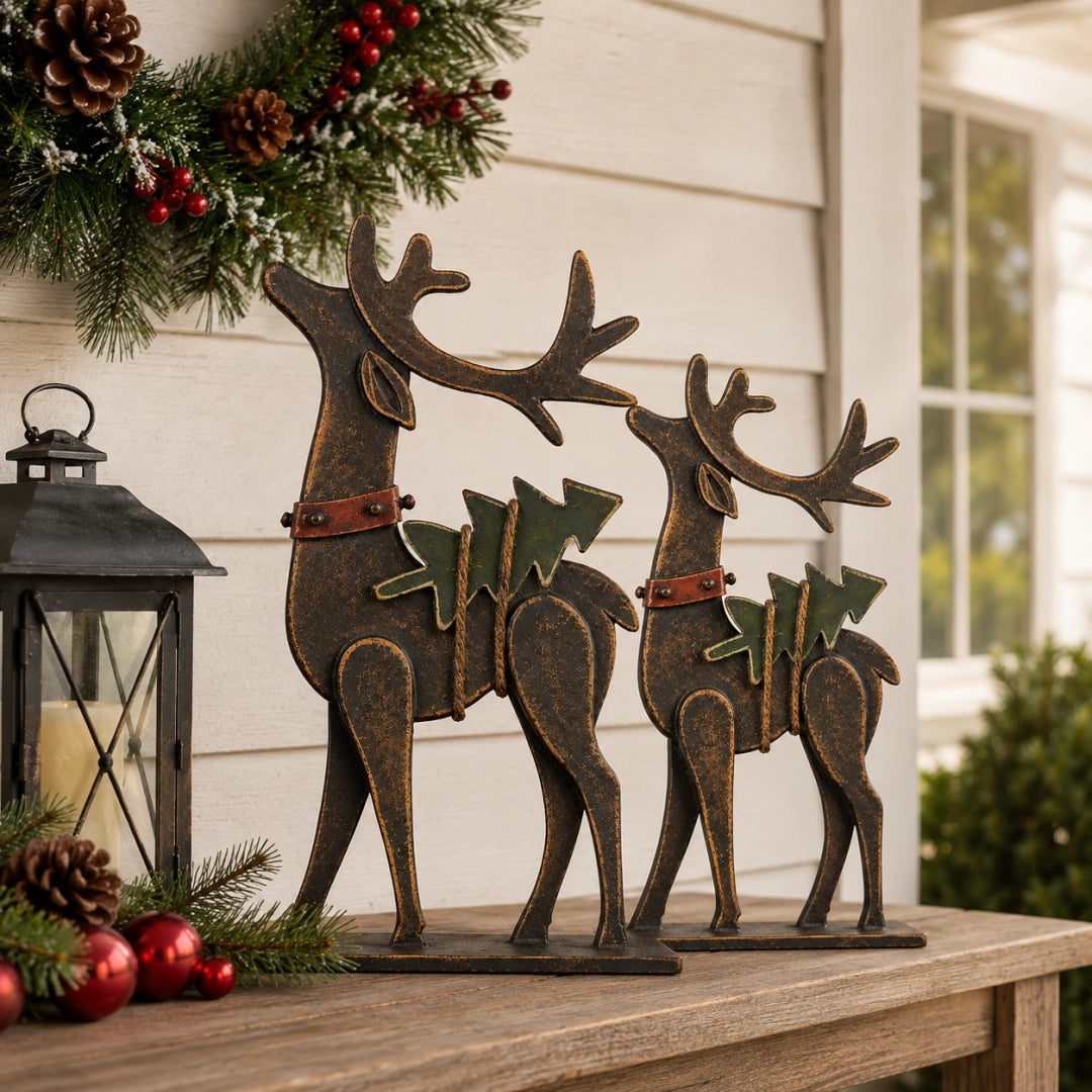 A pair of rustic metal reindeer styled on a covered porch