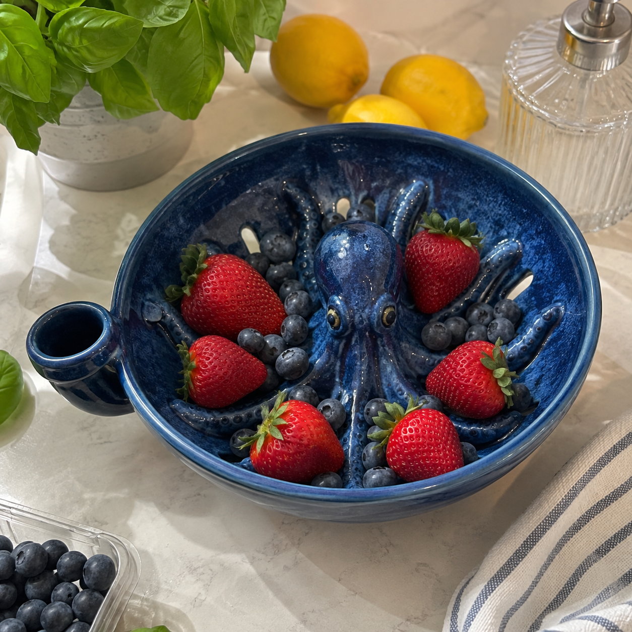 Strawberries and blueberries in octopus berry bowl