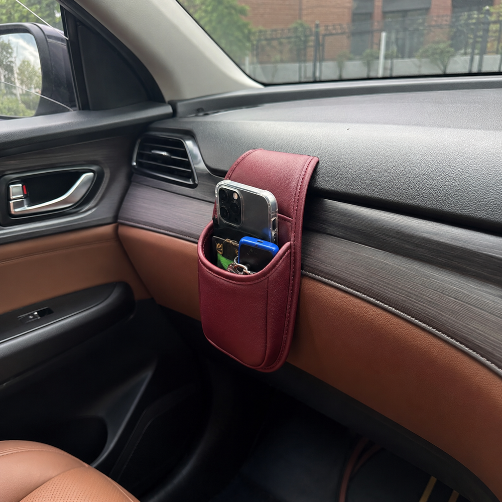 Burgundy car storage pocket installed in vehicle