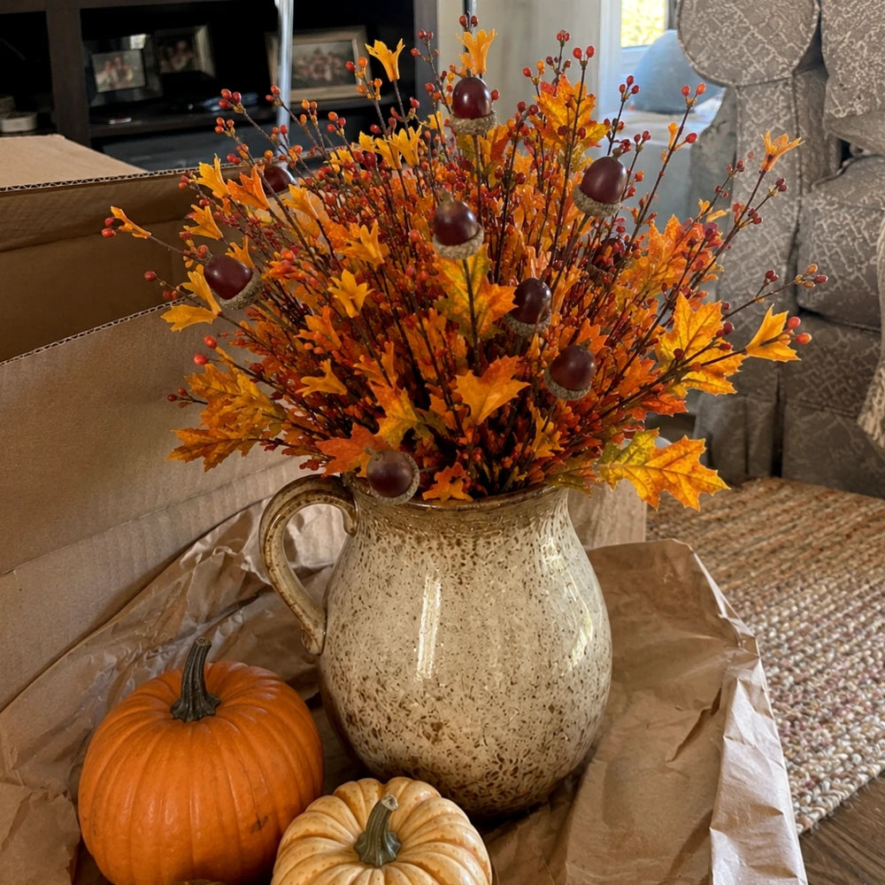 Customer unboxing autumn acorn floral arrangement