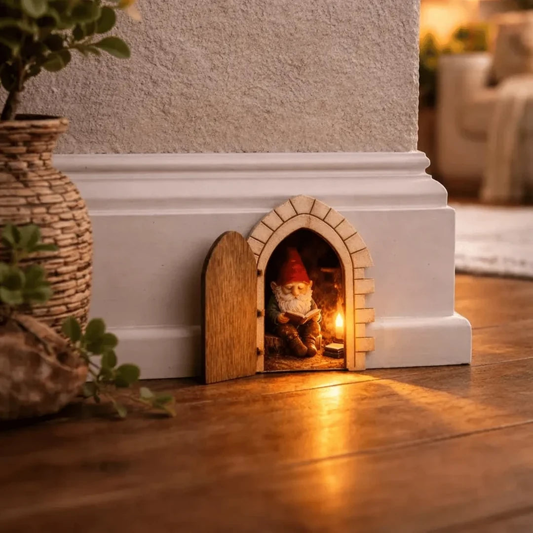 Customer-style image of the fairy door displayed along a baseboard