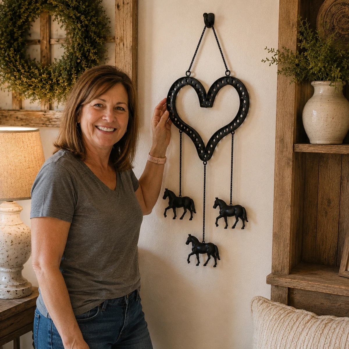 Customer photo showing rustic heart horse hanging decor on the wall
