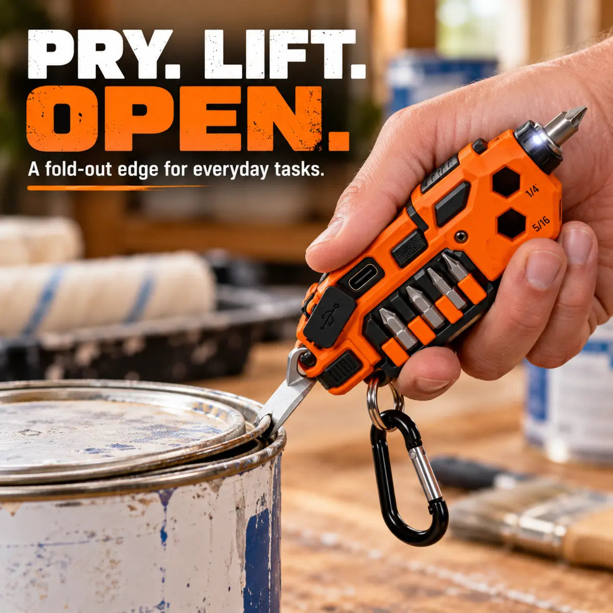 Using the fold-out pry edge on the keychain multi-tool to lift a paint can lid