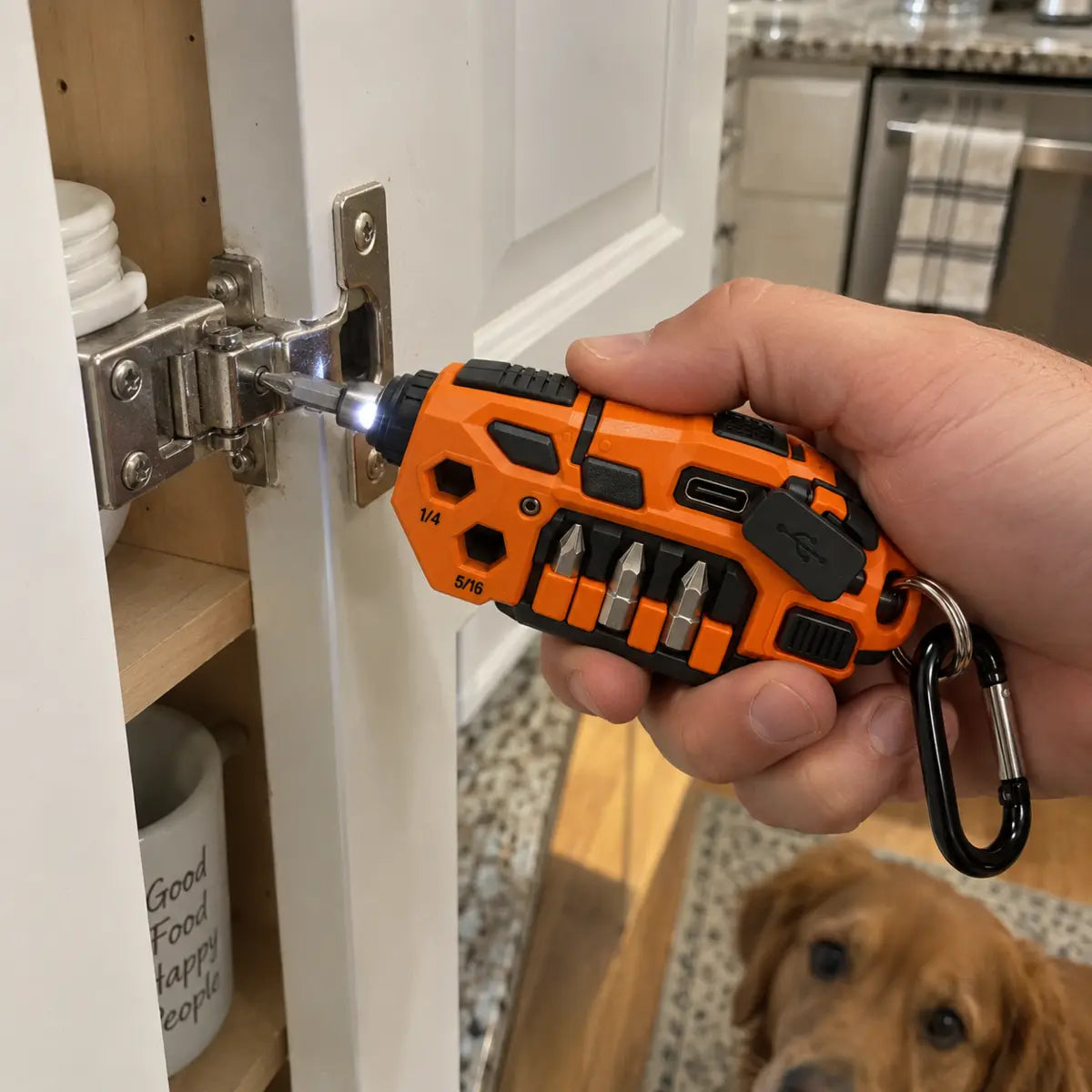 Customer-style photo using the keychain tool on a kitchen cabinet hinge