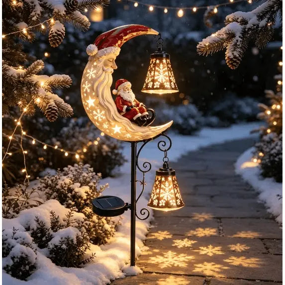 Warm snowflake light patterns projected on a snowy garden path