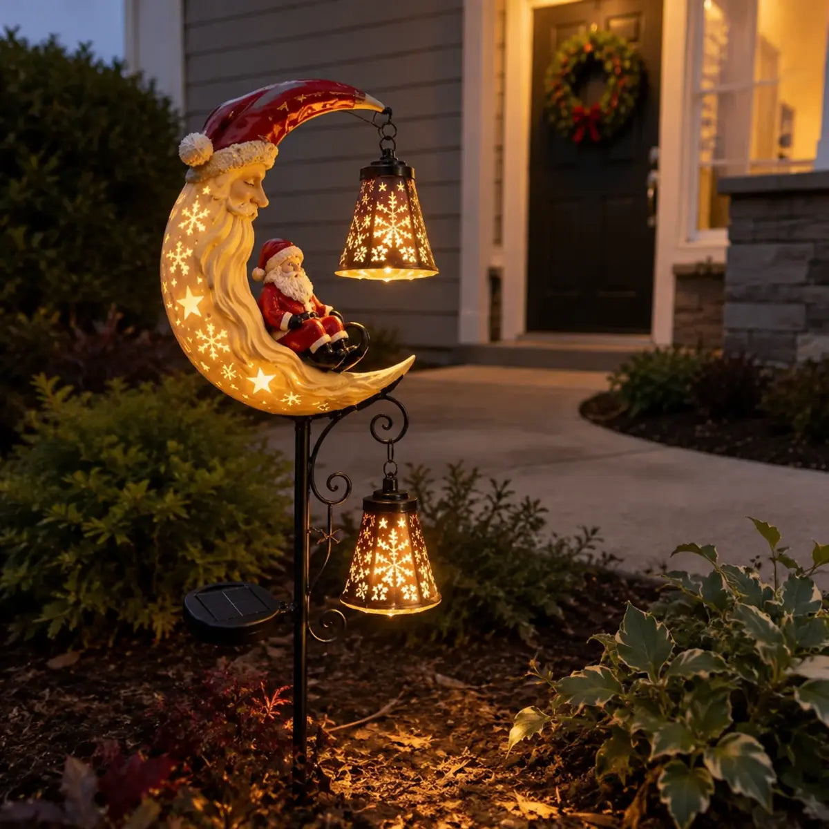 Santa Moonlight Lantern glowing near a front porch