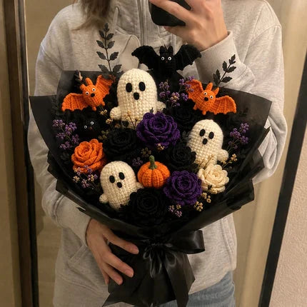Customer holding spooky crochet bouquet in mirror photo