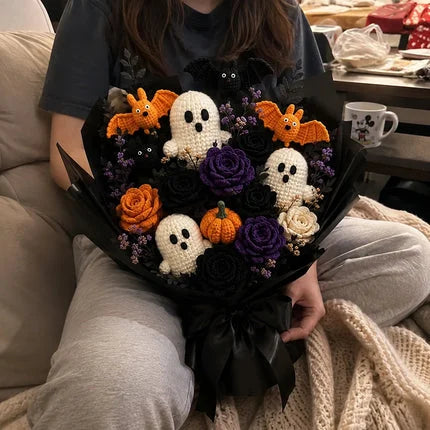 Customer holding finished crochet bouquet at home