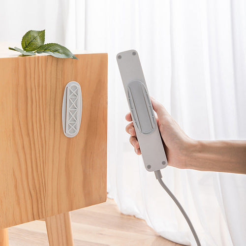 ❄️Summerfresh 50% OFF!🔌No-Drill Power Strip & Extension Lead Holder – Self-Adhesive Slide-Off Wall & Desk Mount