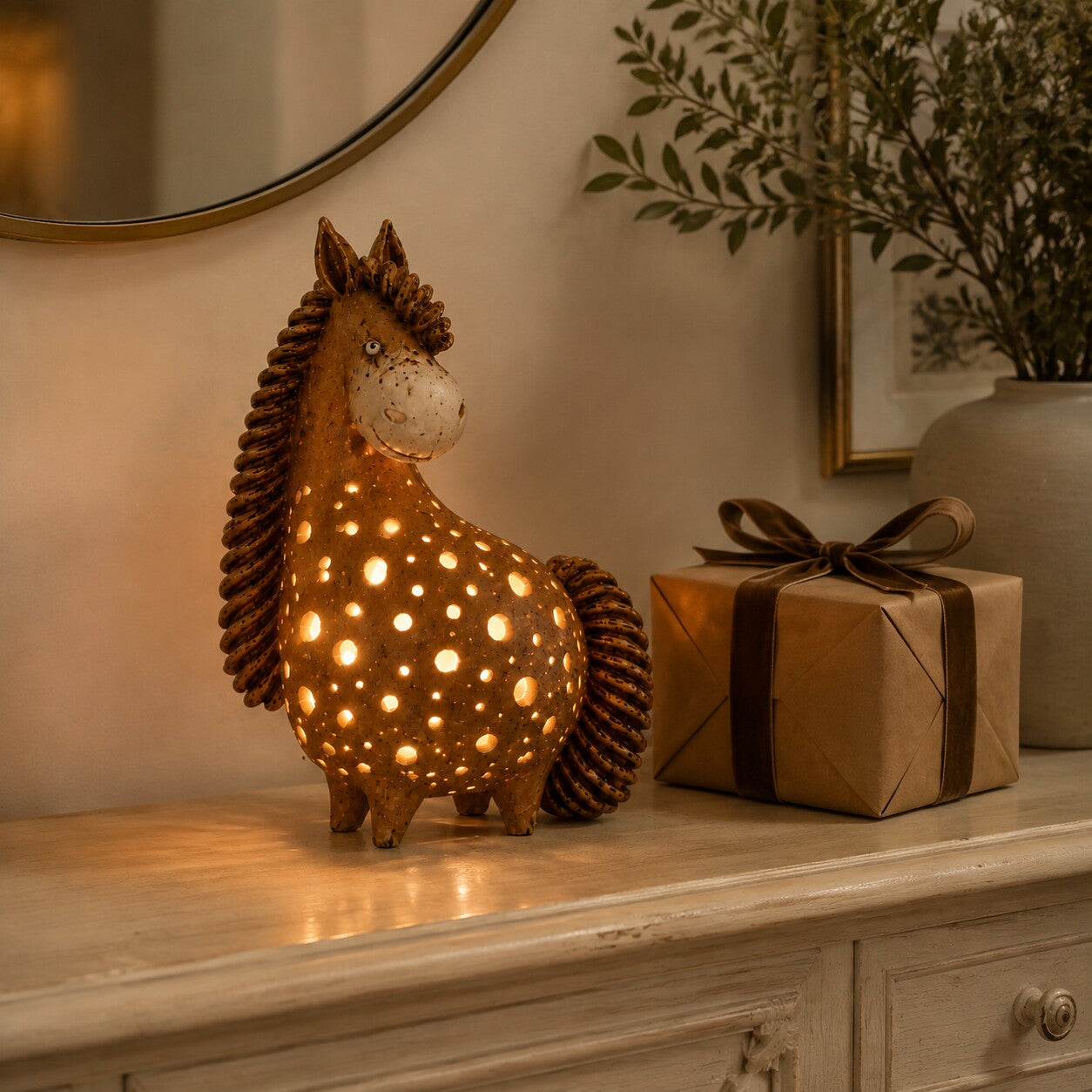 Vintage horse accent light beside an elegantly wrapped gift