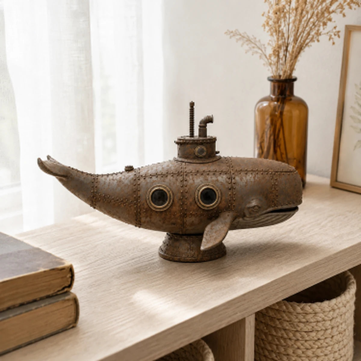 Whale sculpture styled on a light wood shelf